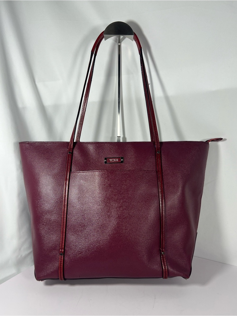 4251: TUMI Burgundy Leather Large Travel Tote Carry-On Luggage Sleeve